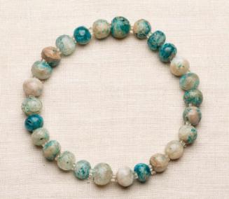 String of blue-glazed quartz beads