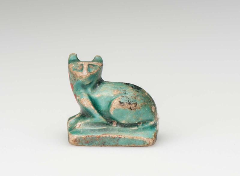 Seal amulet with a carved feline on the back and protective hieroglyphs on the base