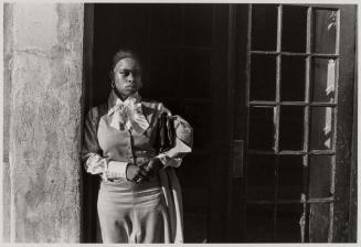 Woman Waiting in Doorway