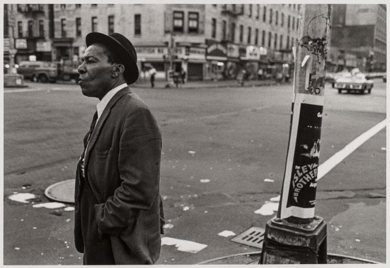 A Man on the Corner of Lenox and 125th Street