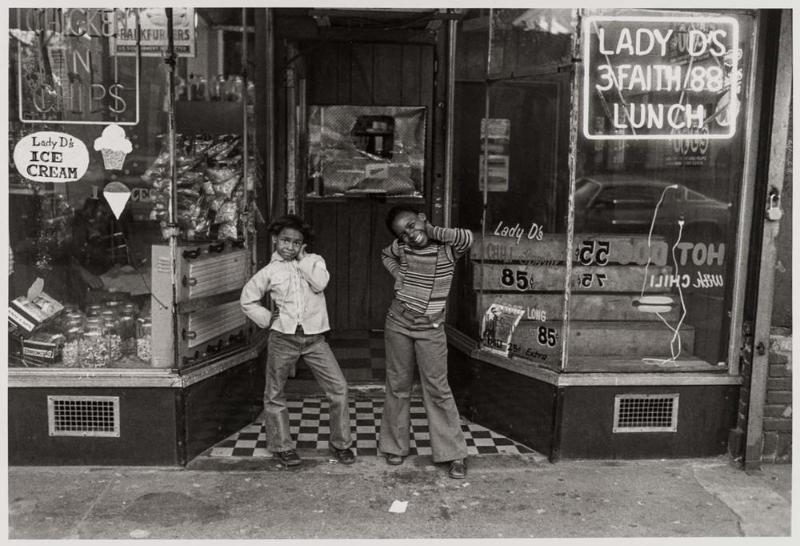 Two Girls in Front of Lady D's