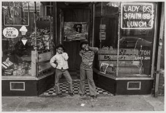Two Girls in Front of Lady D's