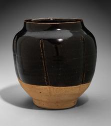 Black-glazed lobed vessel