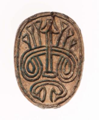 Openwork scarab with a woven-pattern design base