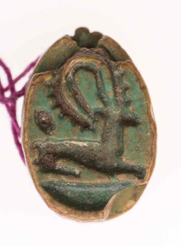 Scarab with kneeling ibex