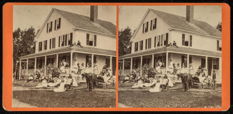 View of House with People Posed in Front