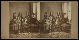 Group of Seven Women Posed with Young Child