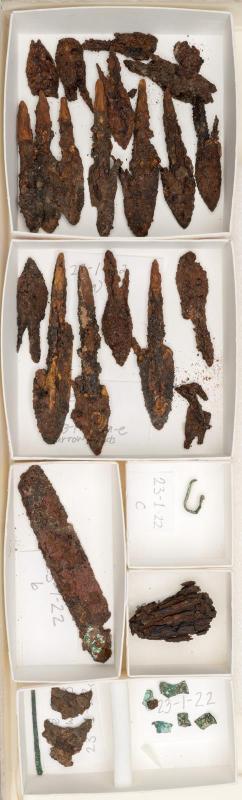Arrowheads, knife, and metal fragments
