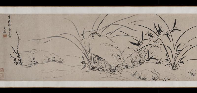 Orchid, rocks, and bamboo