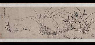 Orchid, rocks, and bamboo