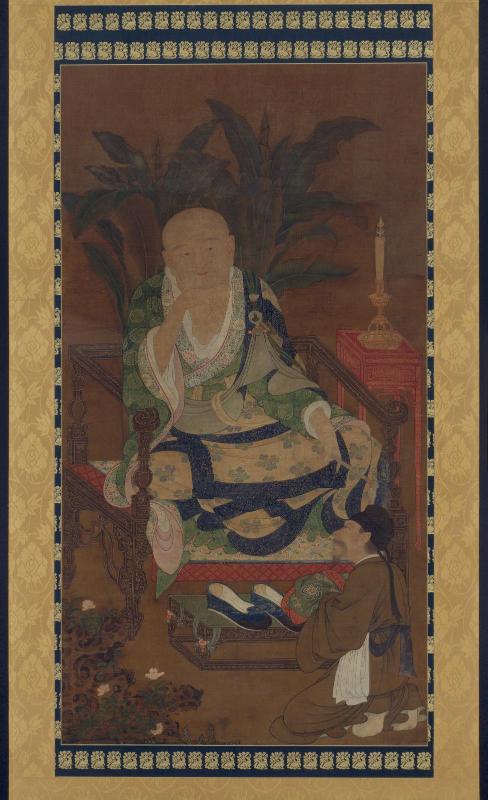 Luohan seated on a lacquer chair, with an attendant