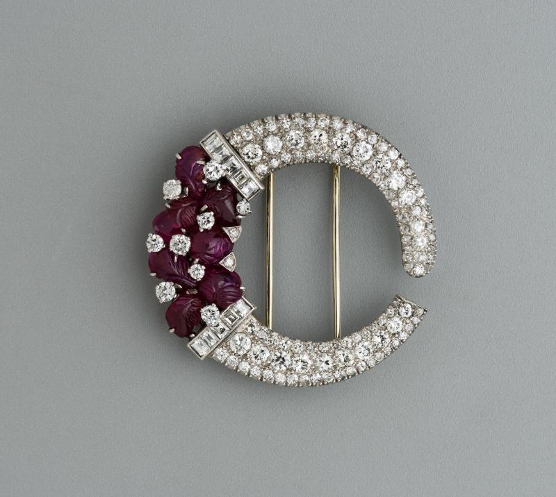 Platinum, diamond, and carved ruby brooch