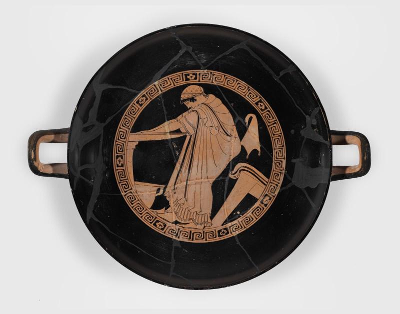 Drinking cup (kylix) with woman washing at a basin (louterion)