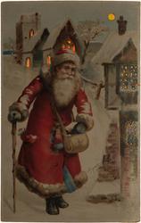 Santa with walking stick and red coat.

