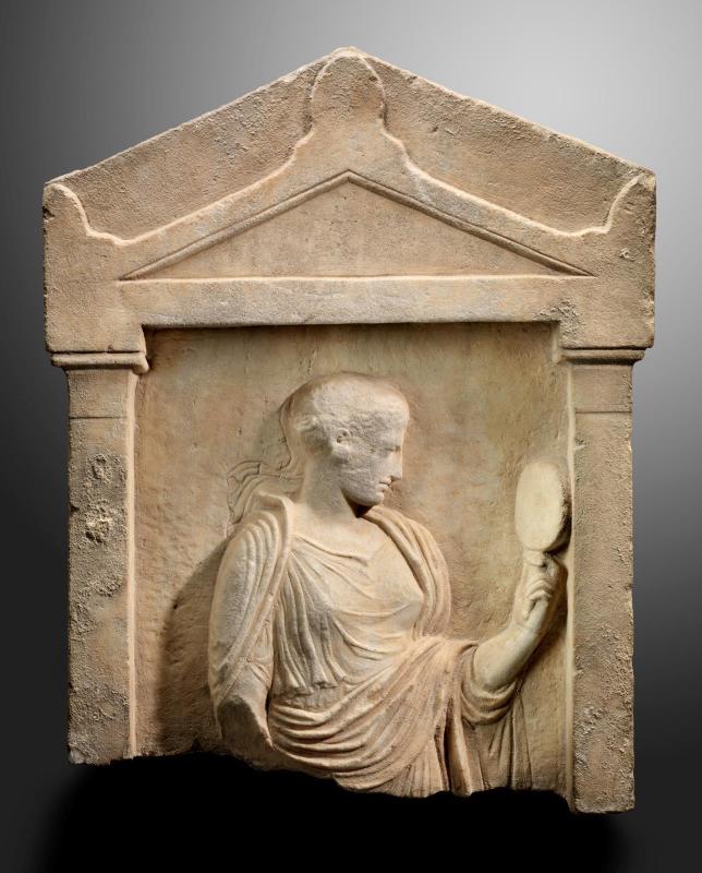 Grave stele with  woman holding a mirror