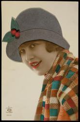 Woman in checkered scarf with grey fabric hat.
