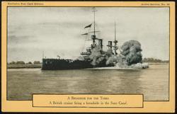 A BROADSIDE FOR THE TURKS 
A British cruiser firing a broadside in the Suez Canal.
