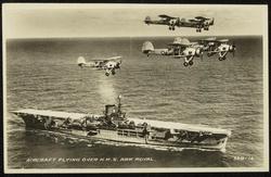 AIRCRAFT FLYING OVER H.M.S. ARK ROYAL.
