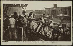 SHIPPING THE NEW 12 PDR GUNS ON BOARD A BATTLESHIP.
