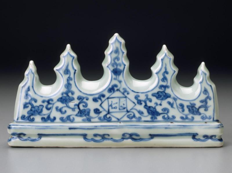 Brush rest with blue-and-white decoration and Persian inscription