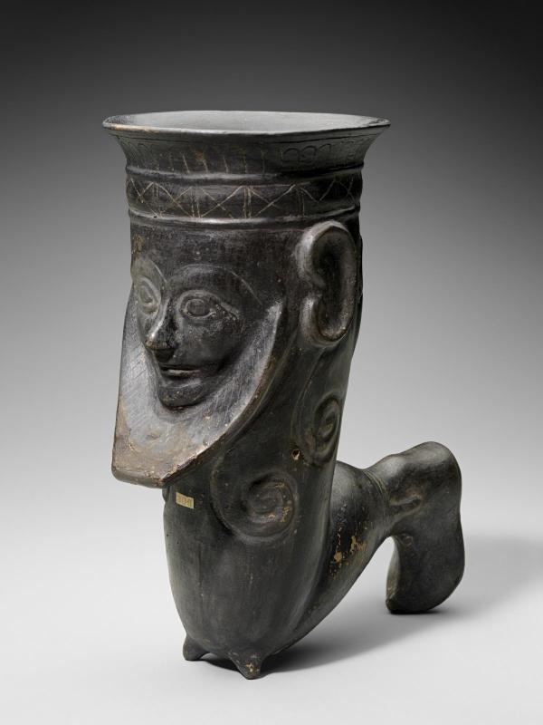 Drinking cup in the shape of a bent leg