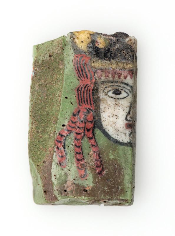 Half of mosaic glass face