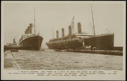 A WORLD'S RECORD. ONE THIRD OF A MILE OF IRON AND STEEL IN TWO SHIPS. THE WHITE STAR LINERS "OLYMPIC" AND "TITANIC" AT BELFAST. tHE ILL-FATED "TITANIC" (TO THE RIGHT), WITH 1500 SOULS. APRIL 15th, 1912.
