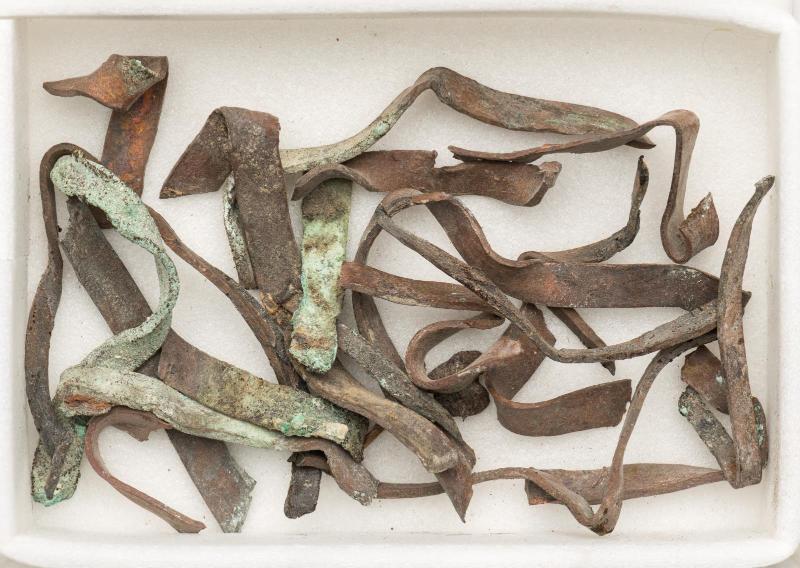 Fragments of copper strip