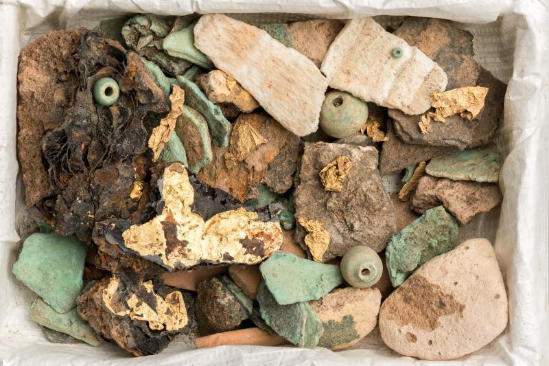 Fragments ofdecorated leather clothing