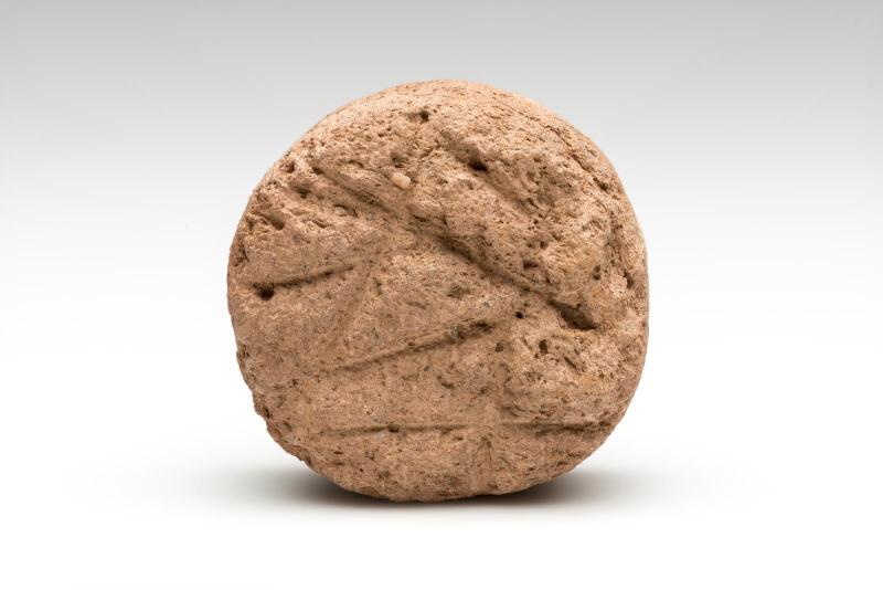 Incised pottery disc