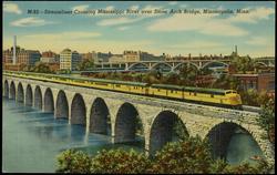 M-92 - Streamliner Crossing Mississippi River over Stone Arch Bridge, Minneapolis, Minn.
