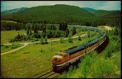 A trip aboard the luxurious Vista-Dome California Zephyr is filled with thrills as the train travels for hundreds of miles through the Alpine meadows and awesome canyons of the colorful Colorado Rockies during daylight hours.

