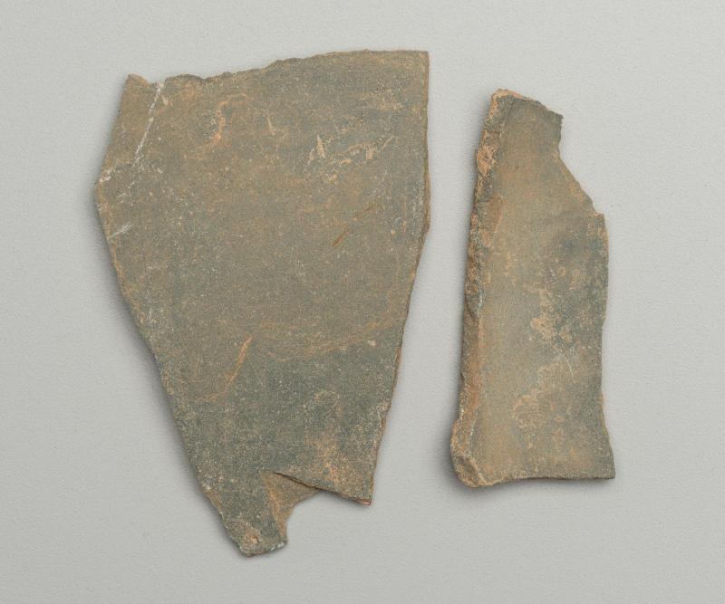 Fragments of a slate vessel