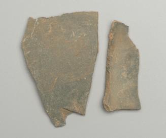 Fragments of a slate vessel