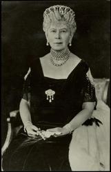 Queen Mary - 3/4 length seated study of Queen Mary in black.

