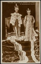THE KING AND QUEEN IN CORONATION ROBES AT BUCKINGHAM PALACE
