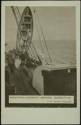 HOISTING LIFEBOAT ABOARD "CARPATHIA".
