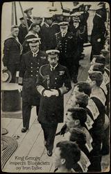 King George inspects Bluejackets on Iron Duke.
