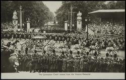 The Coronation Coach viewed from the Victoria Memorial.