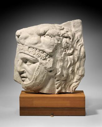 Fragment of a relief with head of soldier (signifer or standard bearer)