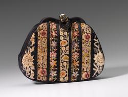 Black evening purse with gold embroidered flowers and panther closure