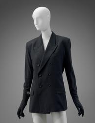 Jacket with attached gloves