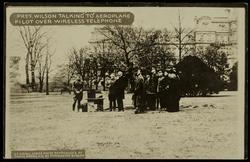 PRES. WILSON TALKING TO AEROPLANE PILOT OVER WIRELESS TELEPHONE
