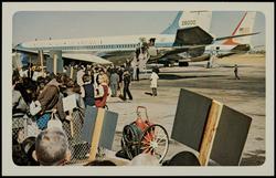 No. 3, President John F. Kennedy and party leaving airplane at Love Field. (Mrs. Kennedy — pink hat.)