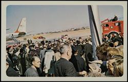 No. 5, Vice-President Johnson, Governor Connally, Mrs. Kennedy (pink hat), other members of party at Dallas Love Field.