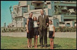 Senator Whitney North Seymour, Jr., and his family visiting the modular housing experiment, "Habitat," at Expo '67. Housing is one of the major fields in which Senator Seymour has proved his effectiveness as a State Legislator in Albany.