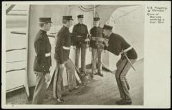 U.S. Flagship "Olympia." Crew of Marines working a 6-pr. Gun.