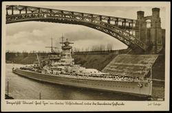 German warship with crew on deck.