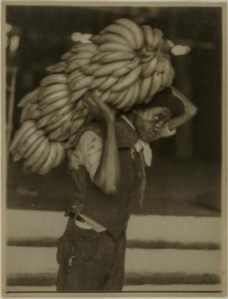Untitled (worker with load of bananas)
