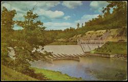 DOVER DAM, one of fourteen dams in the Muskingum Conservancy District, is located on Ohio Route No. 8 near Dover, Ohio.